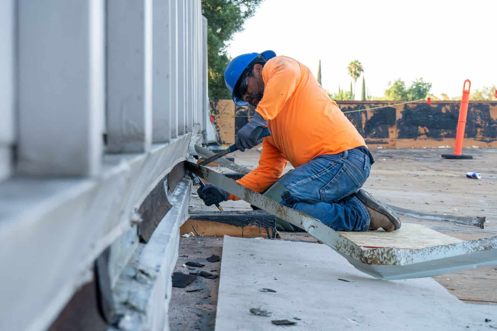 Kodiak worker on a roofing project