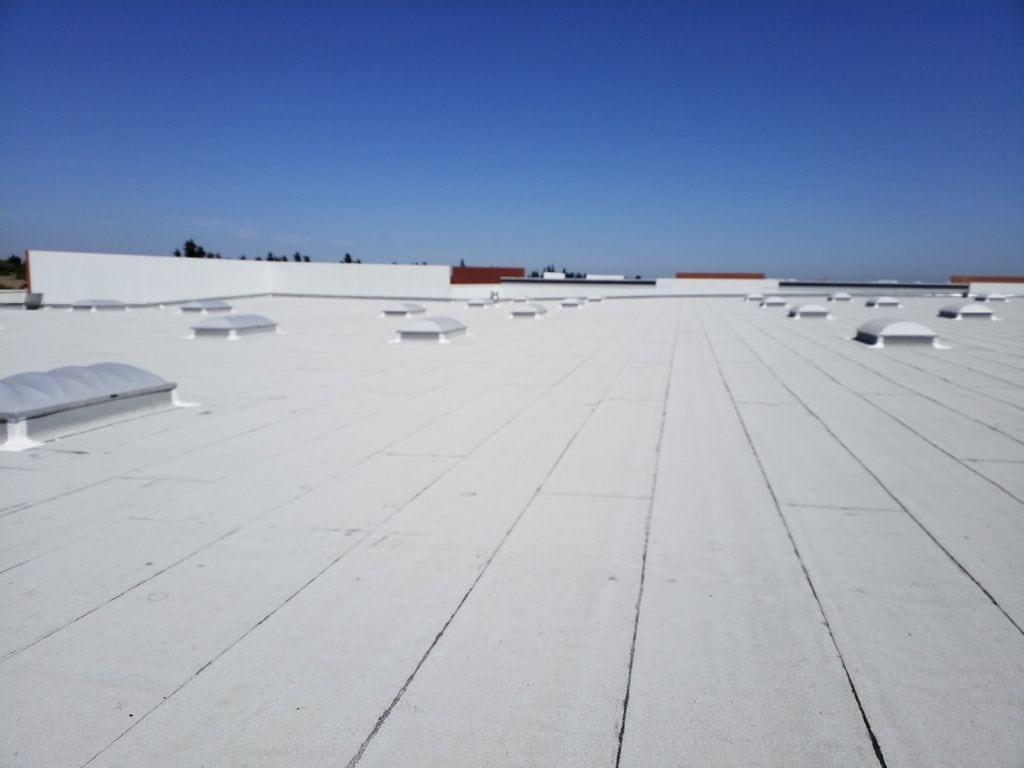 White commercial roof top during the day