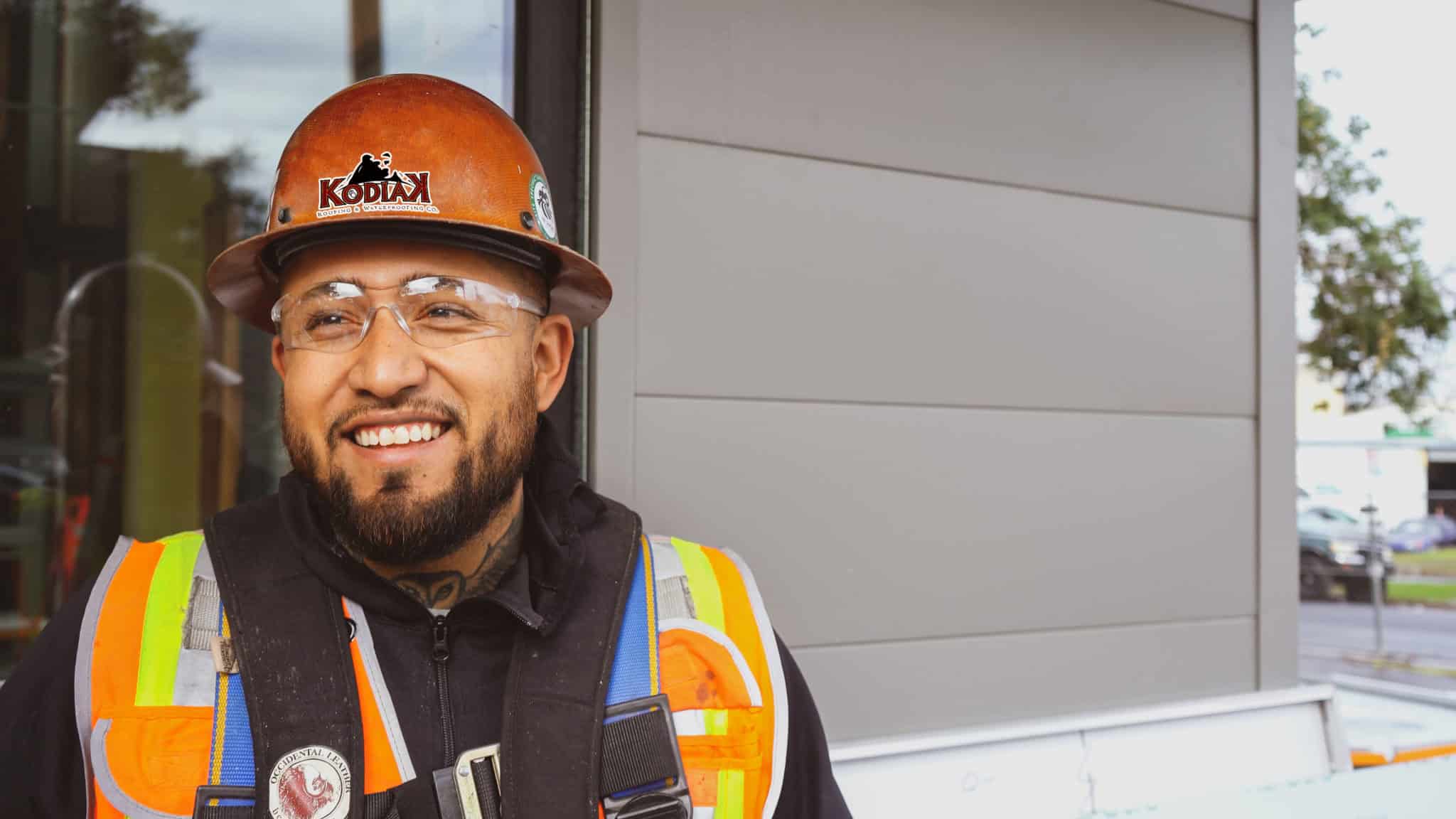 Smiling Kodiak employee wearing a hard hat, representing top-quality roofing, solar, and waterproofing services in Plymouth. Trust Kodiak for all your 'Roofing Near Me,' 'Solar Near Me,' and 'Waterproofing Near Me' needs. Experts in re-roofing, metal roofing, solar installation, and comprehensive waterproofing solutions. Keywords: Plymouth roofing services, Commercial roofing Plymouth, Residential solar installation Plymouth, Plymouth waterproofing solutions, Roof repair Plymouth, Solar energy systems Plymouth, Waterproofing contractors Plymouth, Roof maintenance Plymouth, Solar panel installation Plymouth, Roofing and waterproofing Plymouth. Roofing Amador City, Roofing Ione, Roofing Jackson, Roofing Plymouth, Roofing Sutter Creek, Roofing Angels Camp, Roofing Antioch, Roofing Brentwood, Roofing Clayton, Roofing Concord, Roofing Danville, Roofing El Cerrito, Roofing Hercules, Roofing Lafayette, Roofing Martinez, Roofing Moraga, Roofing Oakley, Roofing Orinda, Roofing Pinole, Roofing Pittsburg, Roofing Pleasant Hill, Roofing Richmond, Roofing San Pablo, Roofing San Ramon, Roofing Walnut Creek, Roofing Placerville, Roofing South Lake Tahoe, Roofing Clearlake, Roofing Lakeport, Roofing American Canyon, Roofing Calistoga, Roofing Napa, Roofing St. Helena, Roofing Yountville, Roofing Grass Valley, Roofing Nevada City, Roofing Truckee, Roofing Auburn, Roofing Colfax, Roofing Lincoln, Roofing Loomis, Roofing Rocklin, Roofing Roseville, Roofing Citrus Heights, Roofing Elk Grove, Roofing Folsom, Roofing Galt, Roofing Isleton, Roofing Rancho Cordova, Roofing Sacramento, Roofing Escalon, Roofing Lathrop, Roofing Lodi, Roofing Manteca, Roofing Ripon, Roofing Stockton, Roofing Tracy, Roofing Benicia, Roofing Dixon, Roofing Fairfield, Roofing Rio Vista, Roofing Suisun City, Roofing Vacaville, Roofing Vallejo, Roofing Ceres, Roofing Hughson, Roofing Modesto, Roofing Newman, Roofing Oakdale, Roofing Patterson, Roofing Riverbank, Roofing Turlock, Roofing Waterford, Roofing Live Oak, Roofing Yuba City, Roofing Davis, Roofing West Sacramento, Roofing Winters, Roofing Woodland, Roofing Marysville, Roofing Wheatland, Roofing Carson City, Roofing Gardnerville, Roofing Genoa, Roofing Minden, Roofing Fernley, Roofing Yerington, Roofing Dayton, Roofing Silver Springs, Roofing Smith Valley, Roofing Stagecoach, Roofing Virginia City, Roofing Lockwood, Roofing Reno, Roofing Sparks, Roofing Incline Village, Roofing Sun Valley, Roofing Cold Springs, Roofing Spanish Springs, Roofing Lemmon Valley.